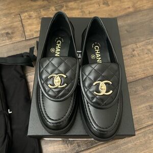 CHANEL Black Quilted Loafers with Gold Emblem size 36